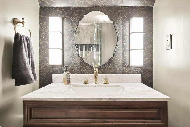 437 Barrington Rdg, Pataskala, OH 43062 - bathroom featuring wallpapered walls and vanity