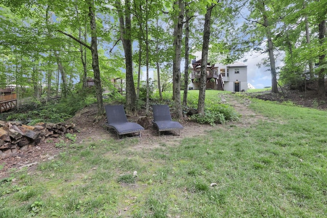 437 Barrington Rdg, Pataskala, OH 43062 - view of grassy yard with stairway and a wooden deck