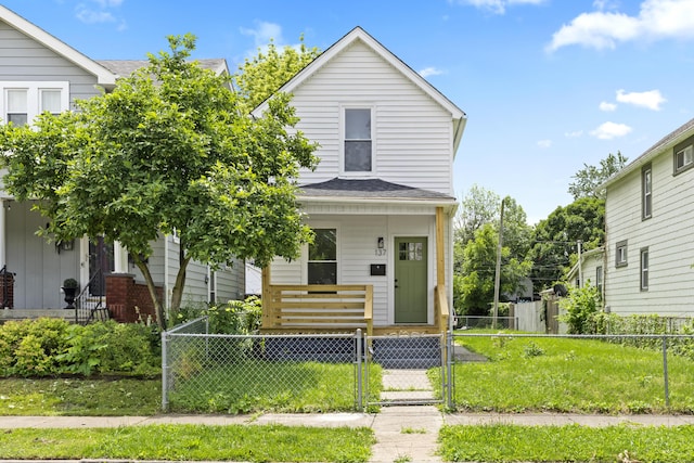 137 E Morrill Ave, Columbus, OH 43207 - view of front facade featuring covered porch, a fenced front yard, a gate, and a shingled roof