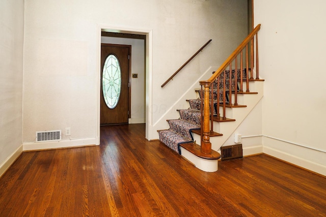 670 Greenwich St, Worthington, OH 43085 - entryway with wood finished floors and stairs
