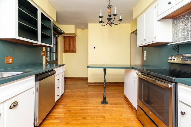 670 Greenwich St, Worthington, OH 43085 - kitchen featuring stainless steel appliances, light wood-type flooring, white cabinetry, open shelves, and a chandelier