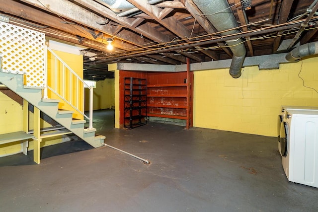 670 Greenwich St, Worthington, OH 43085 - unfinished below grade area featuring washer / clothes dryer and stairway