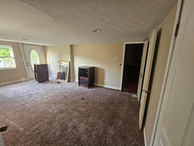710 Glendower Ave, Columbus, OH 43207 - interior space with a textured ceiling and light carpet