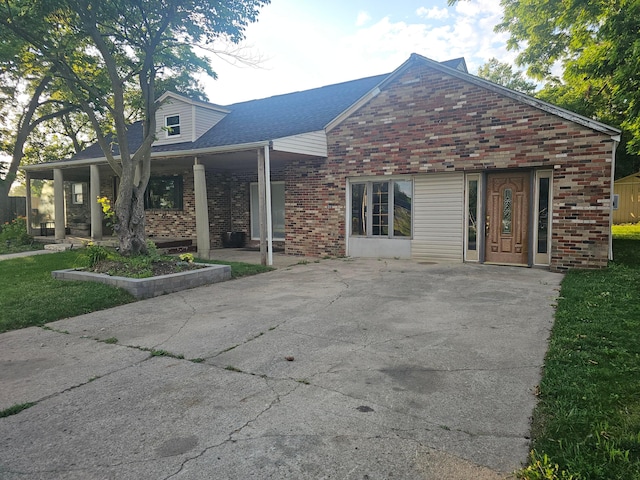 710 Glendower Ave, Columbus, OH 43207 - view of front of property featuring brick siding and covered porch