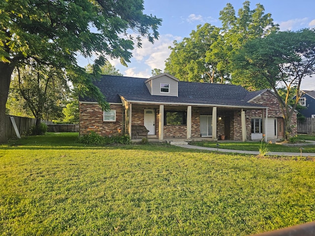 710 Glendower Ave, Columbus, OH 43207 - view of front of home featuring brick siding, a shingled roof, and covered porch