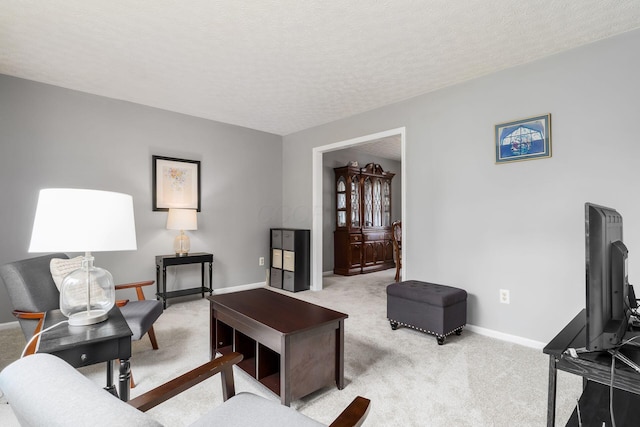 2740 Mitzi Dr, Columbus, OH 43209 - living area with light carpet and a textured ceiling