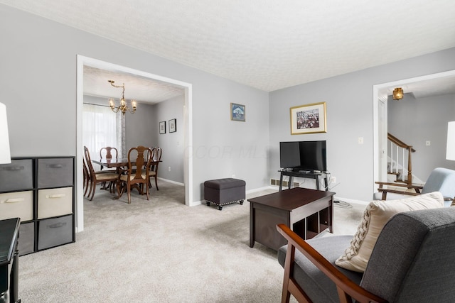 2740 Mitzi Dr, Columbus, OH 43209 - living area with a chandelier, light carpet, and a textured ceiling