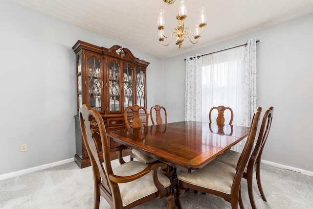 2740 Mitzi Dr, Columbus, OH 43209 - dining area with a chandelier and light carpet