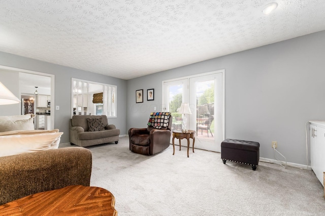 2740 Mitzi Dr, Columbus, OH 43209 - carpeted living area with healthy amount of natural light and a textured ceiling