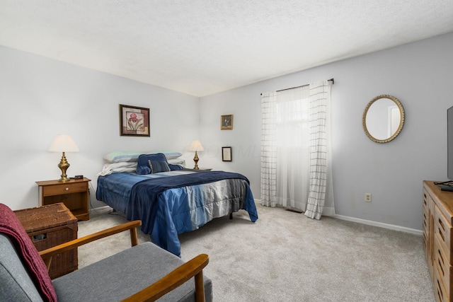 2740 Mitzi Dr, Columbus, OH 43209 - carpeted bedroom with baseboards and a textured ceiling