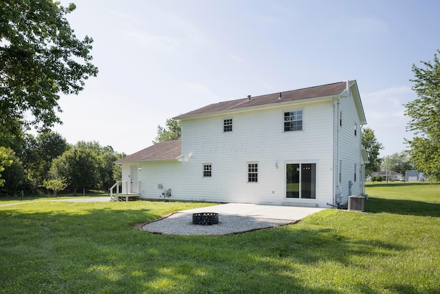 6704 Blacks Rd SW, Pataskala, OH 43062 - back of property with a lawn, a patio, and an outdoor fire pit