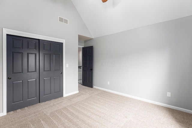 833 Moon Glow Ct, Columbus, OH 43230 - unfurnished bedroom with carpet flooring, high vaulted ceiling, a closet, and ceiling fan