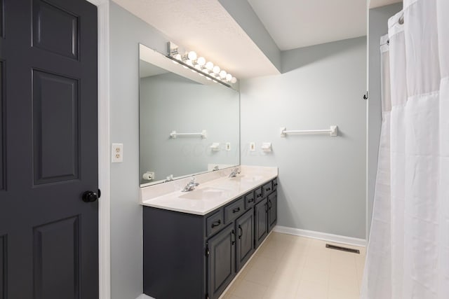 833 Moon Glow Ct, Columbus, OH 43230 - bathroom with double vanity and baseboards