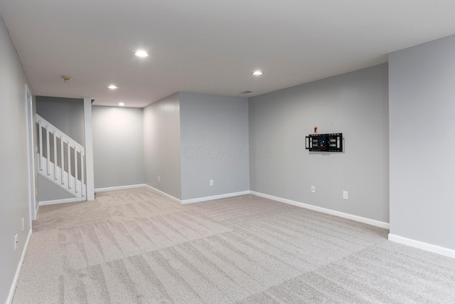833 Moon Glow Ct, Columbus, OH 43230 - finished below grade area featuring light colored carpet, recessed lighting, and stairs