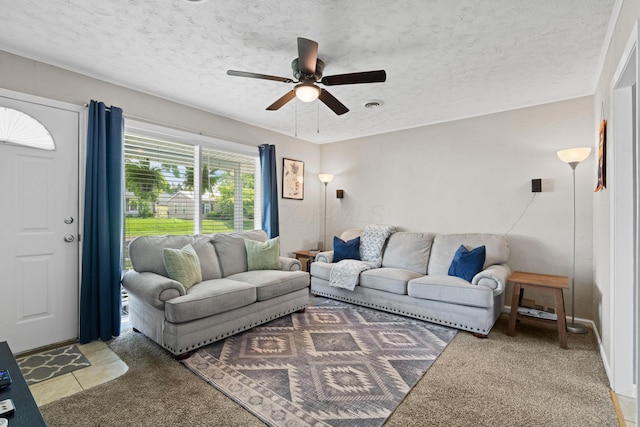 507 Shoshone Dr, Lancaster, OH 43130 - living area with a ceiling fan, a textured ceiling, and light colored carpet