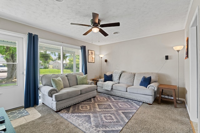 507 Shoshone Dr, Lancaster, OH 43130 - living area with plenty of natural light, a ceiling fan, a textured ceiling, and light tile patterned flooring