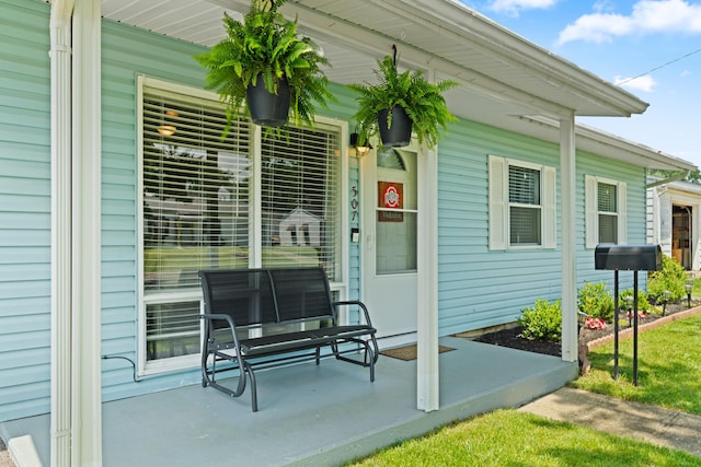 507 Shoshone Dr, Lancaster, OH 43130 - view of exterior entry with a porch