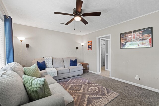 507 Shoshone Dr, Lancaster, OH 43130 - living area with ceiling fan, carpet, and a textured ceiling