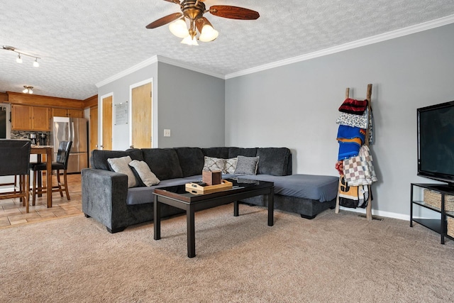 1126 Welwyn Dr, Westerville, OH 43081 - living room with a ceiling fan, a textured ceiling, light colored carpet, and ornamental molding