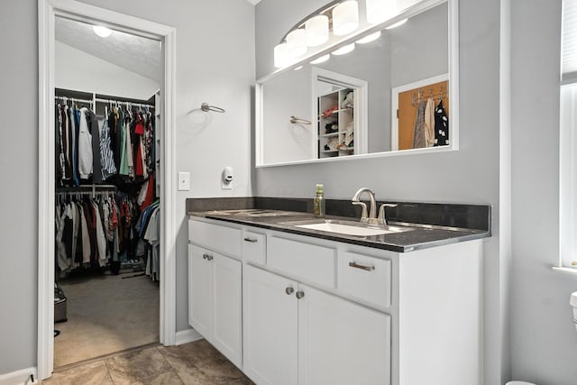 1126 Welwyn Dr, Westerville, OH 43081 - bathroom featuring vanity and a spacious closet