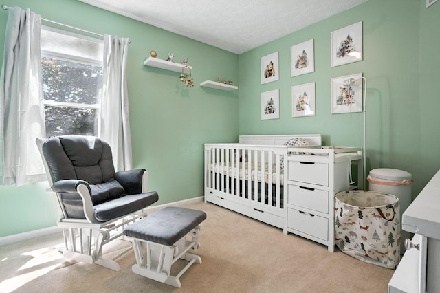 1126 Welwyn Dr, Westerville, OH 43081 - carpeted bedroom with a nursery area and a textured ceiling