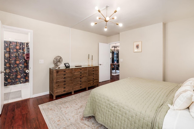 249 E Kossuth St Unit E, Columbus, OH 43206 - bedroom with a chandelier and wood finished floors