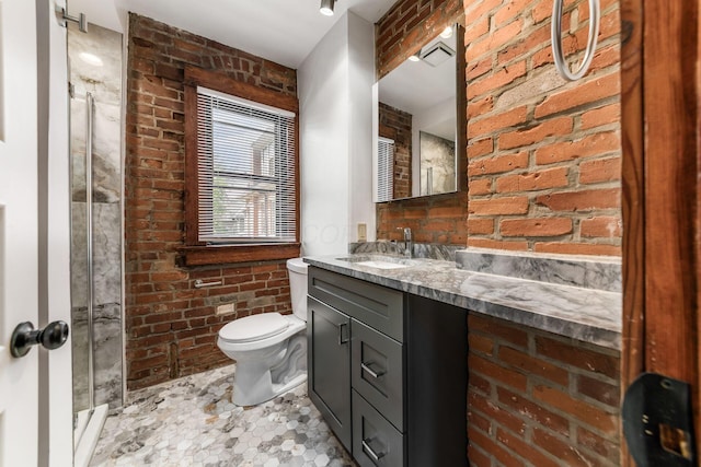 867-871 Delaware Ave, Columbus, OH 43215 - full bath with brick wall, a shower stall, and vanity