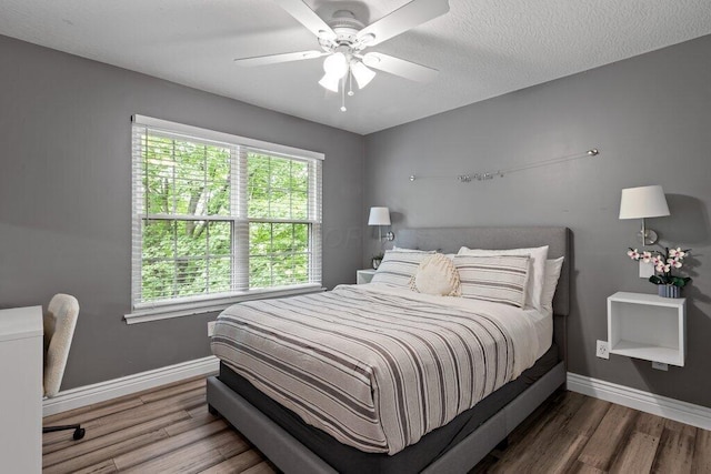 10382 Wright Rd NW, Canal Winchester, OH 43110 - bedroom featuring wood finished floors and a ceiling fan