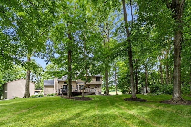 10382 Wright Rd NW, Canal Winchester, OH 43110 - view of grassy yard with a deck