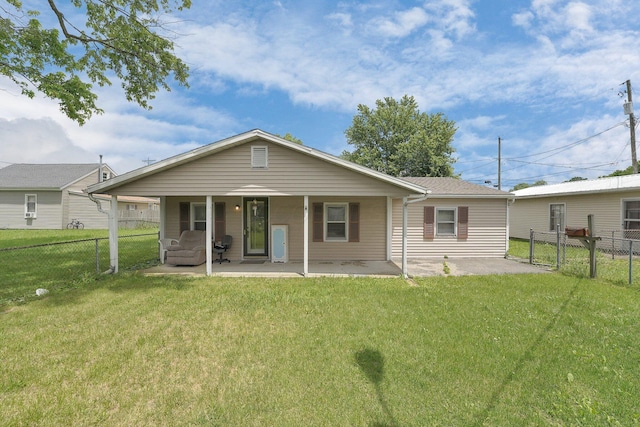 412 E Mill St, Circleville, OH 43113 - rear view of property featuring a fenced backyard, a patio area, and a gate
