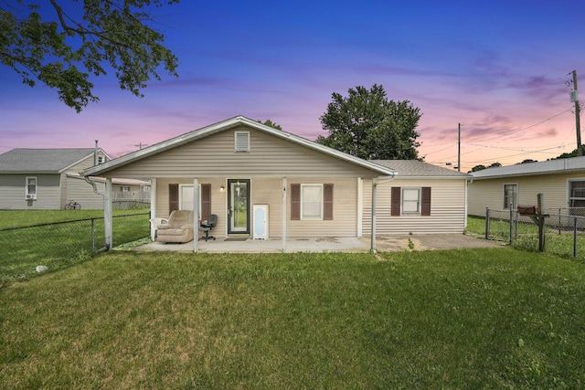 412 E Mill St, Circleville, OH 43113 - rear view of property with a fenced backyard and a patio