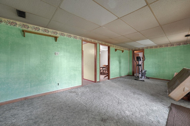 412 E Mill St, Circleville, OH 43113 - empty room featuring a paneled ceiling and carpet flooring