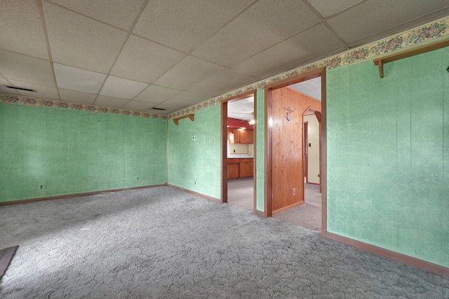 412 E Mill St, Circleville, OH 43113 - carpeted empty room with a drop ceiling