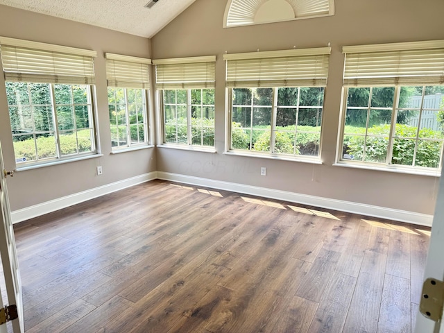 6608 Lakeview Cir, Canal Winchester, OH 43110 - unfurnished sunroom featuring lofted ceiling and wood-type flooring
