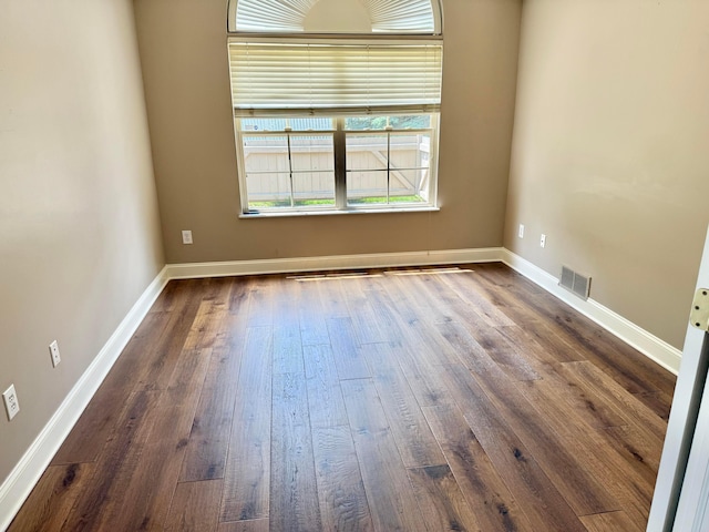6608 Lakeview Cir, Canal Winchester, OH 43110 - empty room with dark wood-style flooring and baseboards