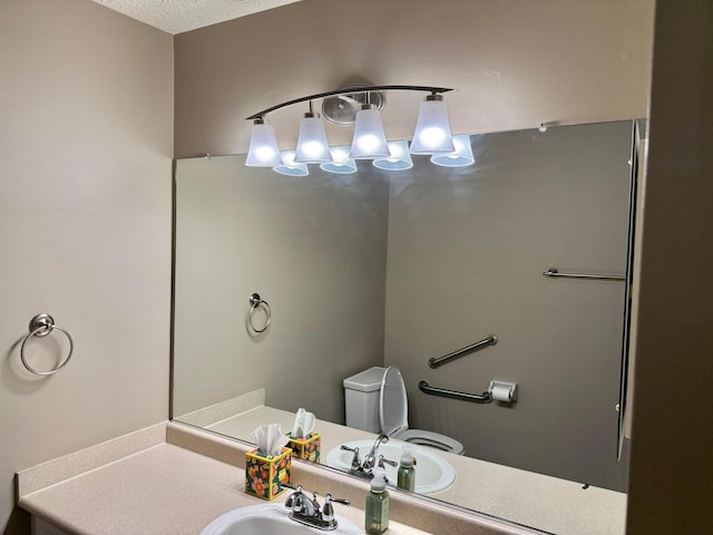 6608 Lakeview Cir, Canal Winchester, OH 43110 - bathroom featuring a chandelier, vanity, and a textured ceiling