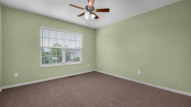6229 Janes Way, Hilliard, OH 43026 - empty room featuring dark colored carpet and a ceiling fan