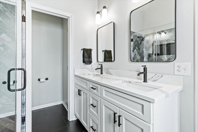 5821 Albany Grv, Westerville, OH 43081 - bathroom featuring double vanity, a marble finish shower, and tile patterned flooring