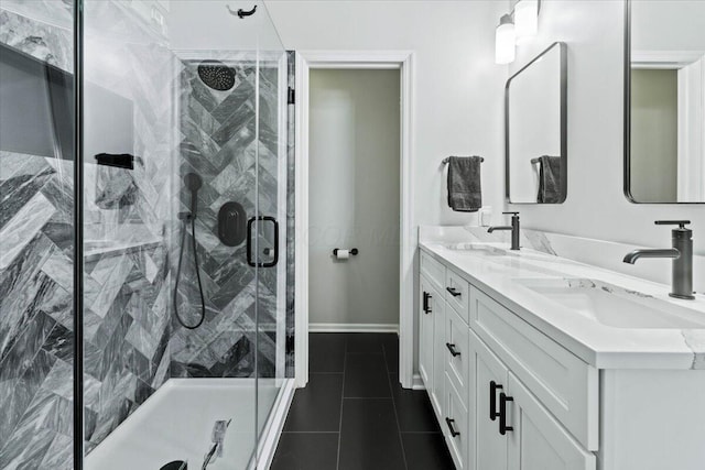 5821 Albany Grv, Westerville, OH 43081 - bathroom with a marble finish shower, double vanity, and tile patterned flooring