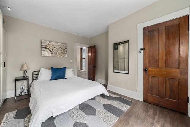 336 E Kossuth St, Columbus, OH 43206 - bedroom featuring dark wood-style floors