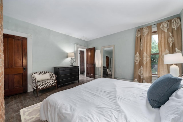 336 E Kossuth St, Columbus, OH 43206 - bedroom featuring dark wood-style floors