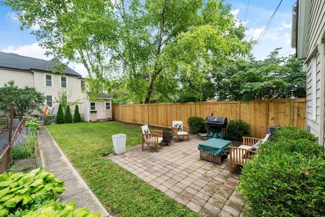 336 E Kossuth St, Columbus, OH 43206 - fenced backyard with a shed and a patio area