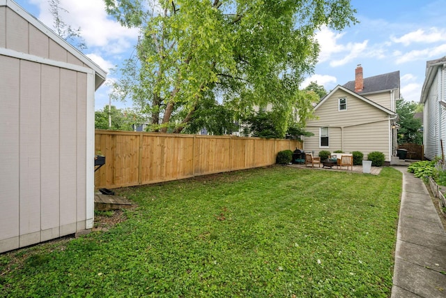 336 E Kossuth St, Columbus, OH 43206 - fenced backyard featuring a patio area