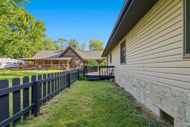4490 N Bank Rd, Buckeye Lake, OH 43008 - fenced backyard with a wooden deck