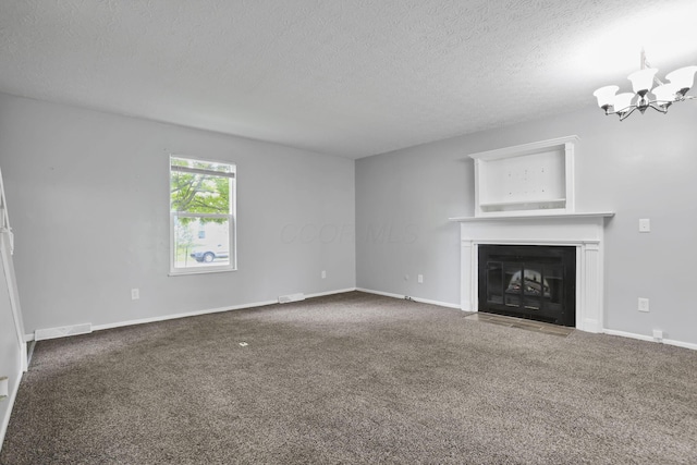7607-7609 Penwood Pl, Columbus, OH 43235 - unfurnished living room featuring carpet floors, a textured ceiling, a chandelier, and a fireplace with flush hearth