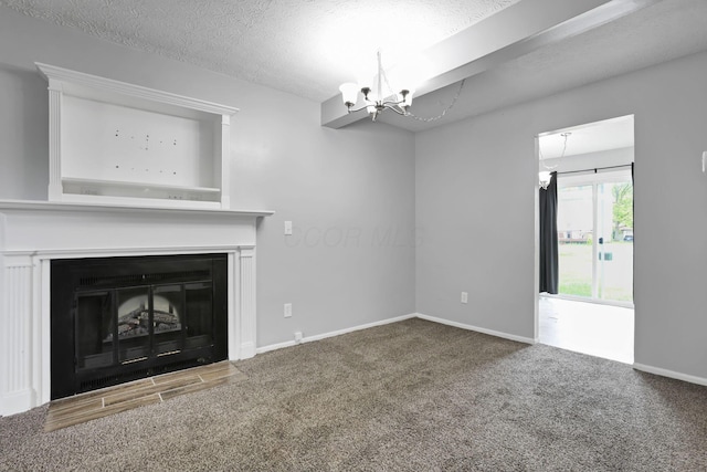 7607-7609 Penwood Pl, Columbus, OH 43235 - unfurnished living room featuring a chandelier, carpet floors, a fireplace with flush hearth, and a textured ceiling