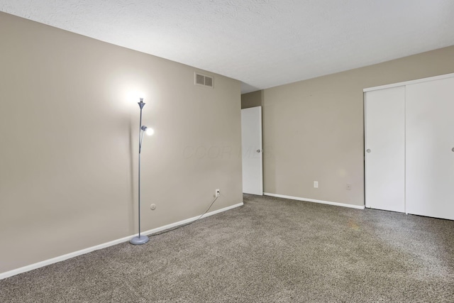 7607-7609 Penwood Pl, Columbus, OH 43235 - unfurnished bedroom featuring carpet flooring and a closet