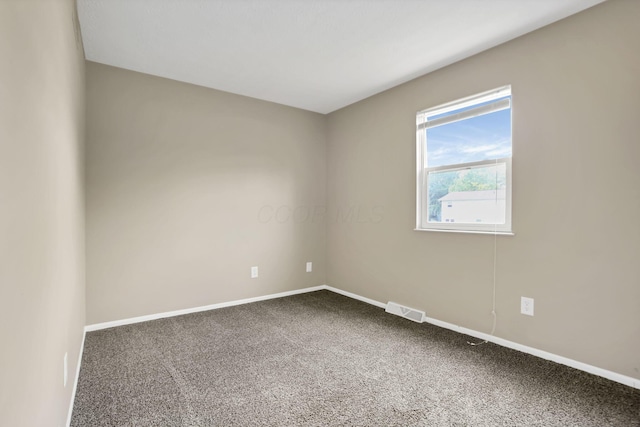 7607-7609 Penwood Pl, Columbus, OH 43235 - carpeted spare room featuring baseboards