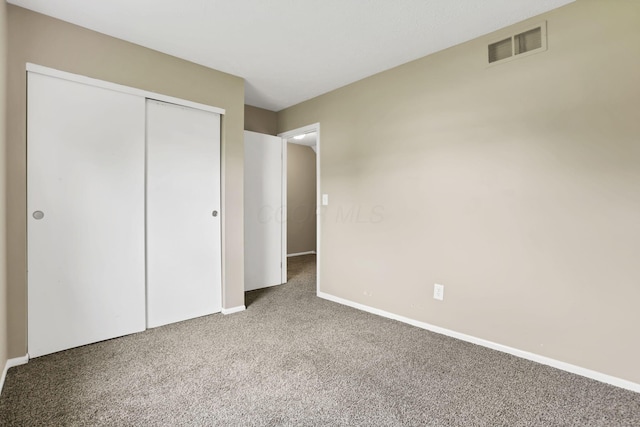 7607-7609 Penwood Pl, Columbus, OH 43235 - unfurnished bedroom with carpet and a closet