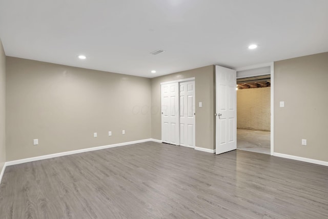 7607-7609 Penwood Pl, Columbus, OH 43235 - finished basement with wood finished floors and recessed lighting